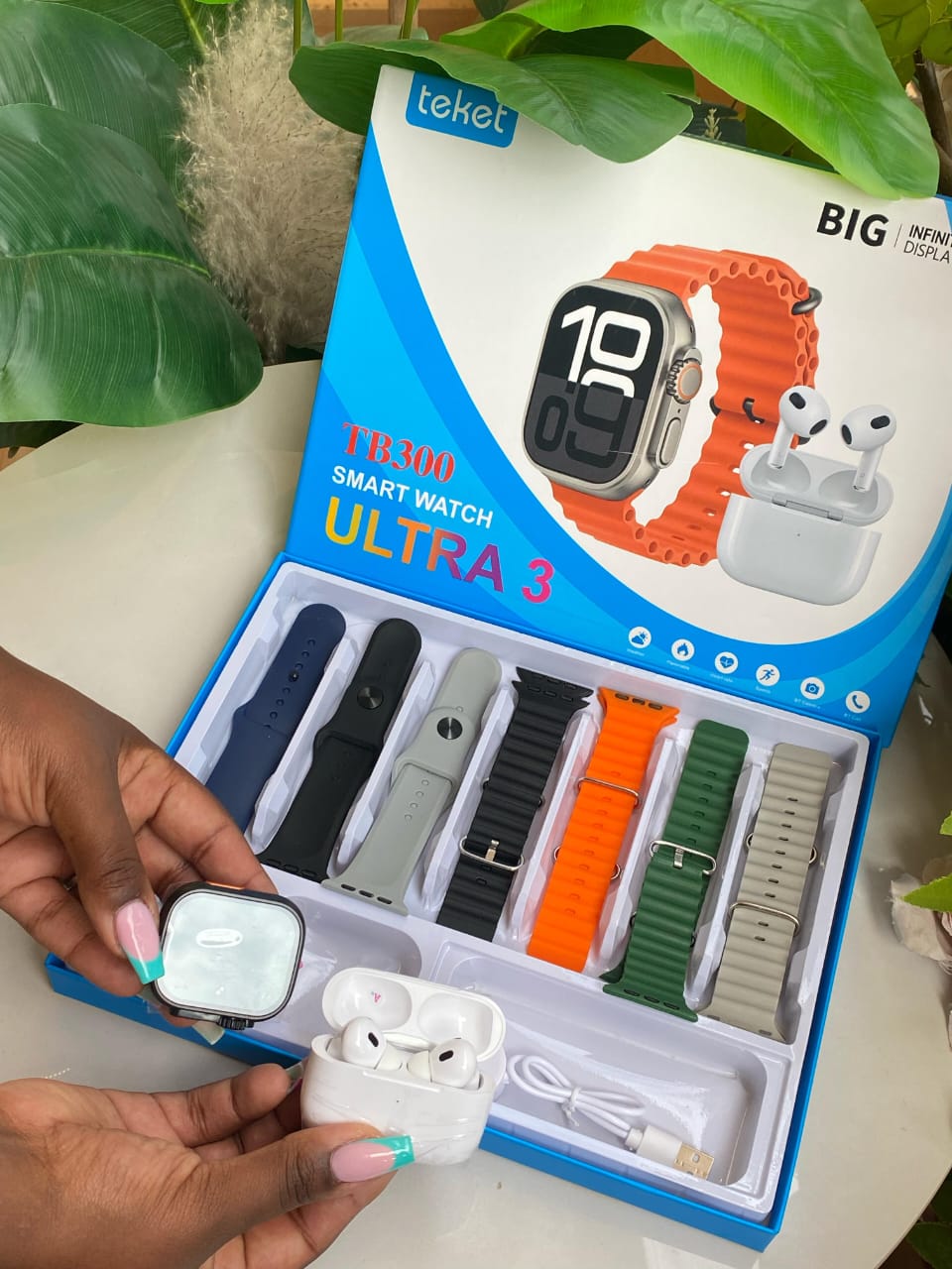 TB300 SMART WATCH WITH EARBUDS AND 7 STRAPS